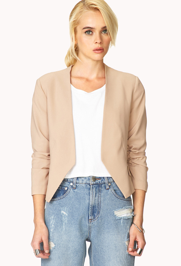 beige collarless blazer